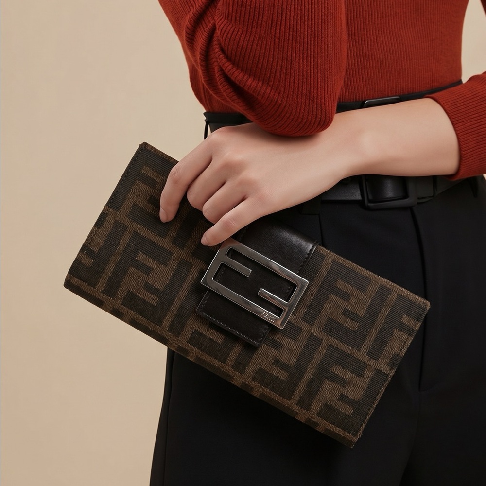 Pre-Loved Fendi Monogram Brown/Black Clutch Silver Logo 7.5x3.5”
